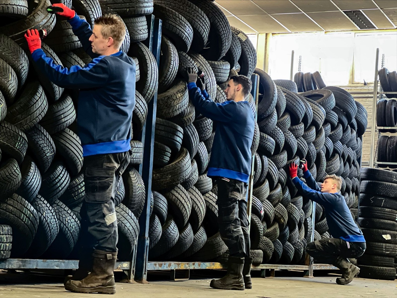 Tread depth being measured on a used tire
